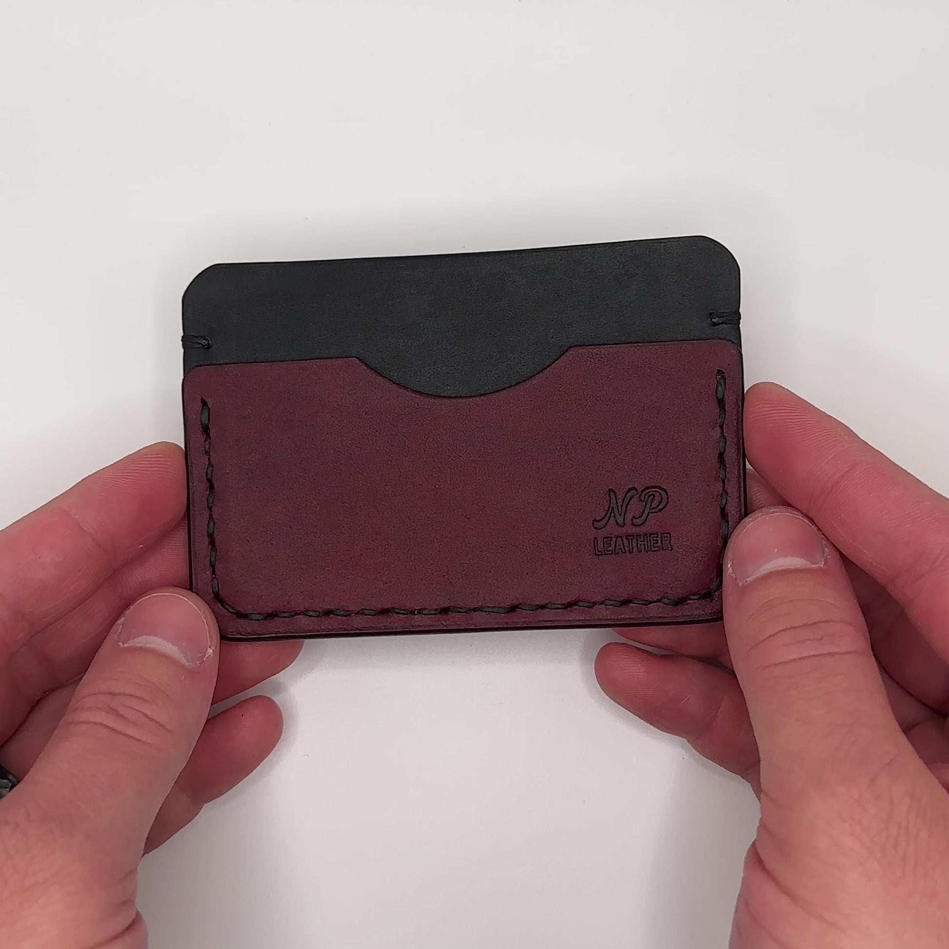 Card wallet in black and red pueblo leather